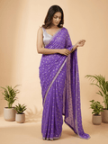 Chinnon fancy saree lavender color allover motifs & embroidery border with running pallu and contrast blouse