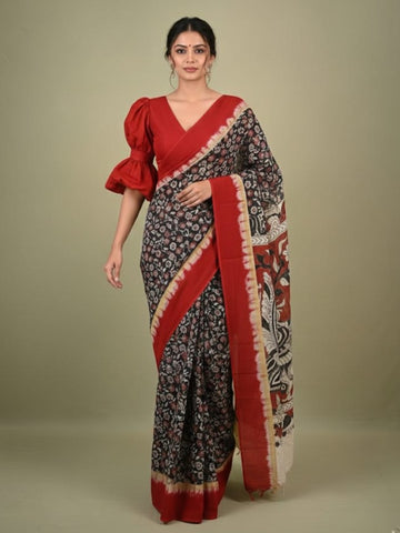 Kalamkari silk saree in black, featuring a contrast color border and plain matching blouse