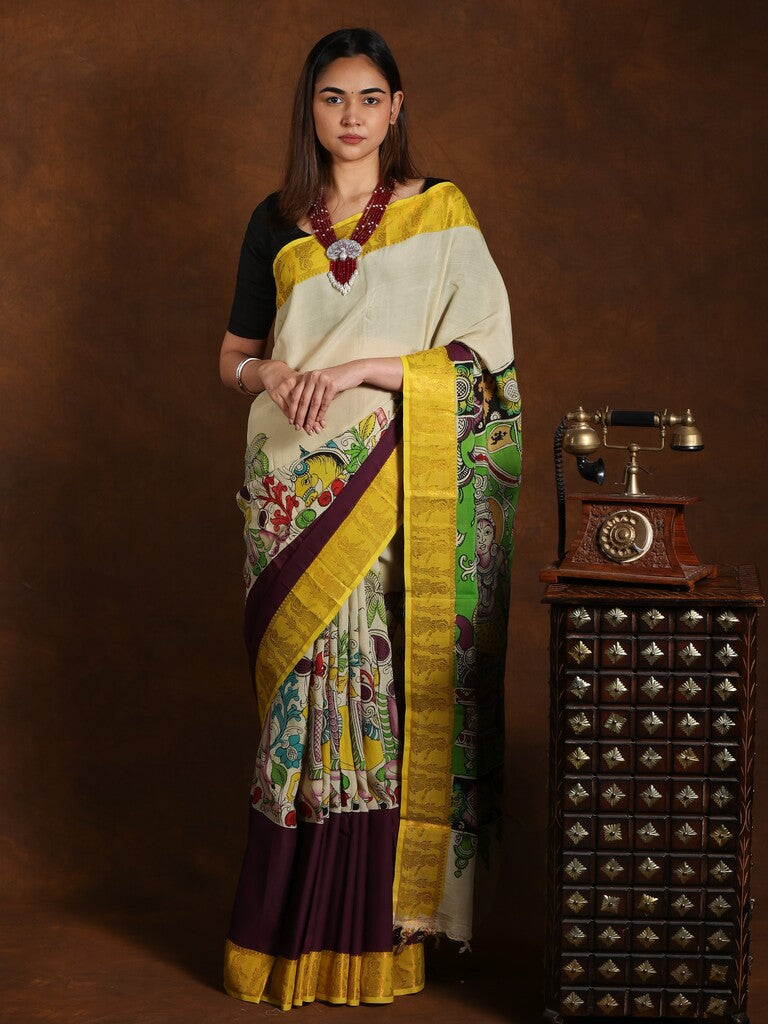 Pen kalamkari pattu saree in cream color with contrast zari border and printed pallu & attached blouse