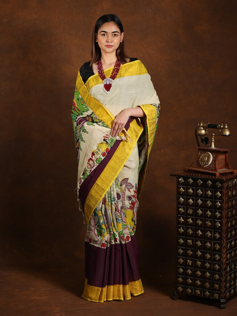 Pen kalamkari pattu saree in cream color with contrast zari border and printed pallu & attached blouse