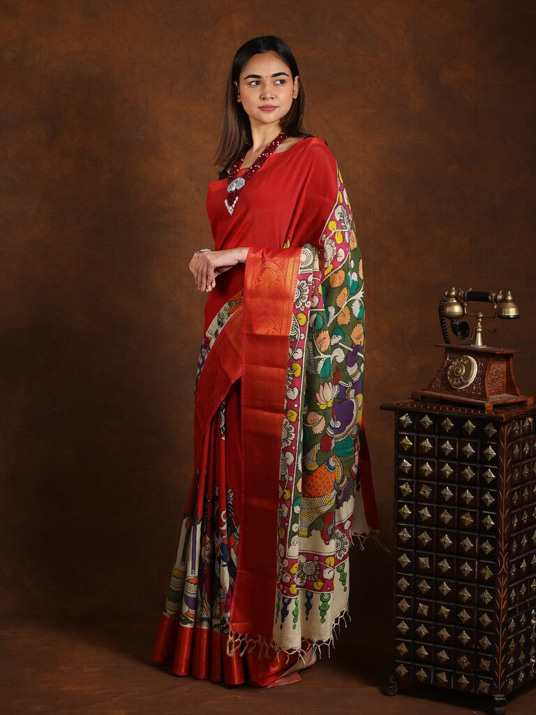 Pen kalamkari pattu saree in maroon color with contrast zari border and printed pallu & attached blouse