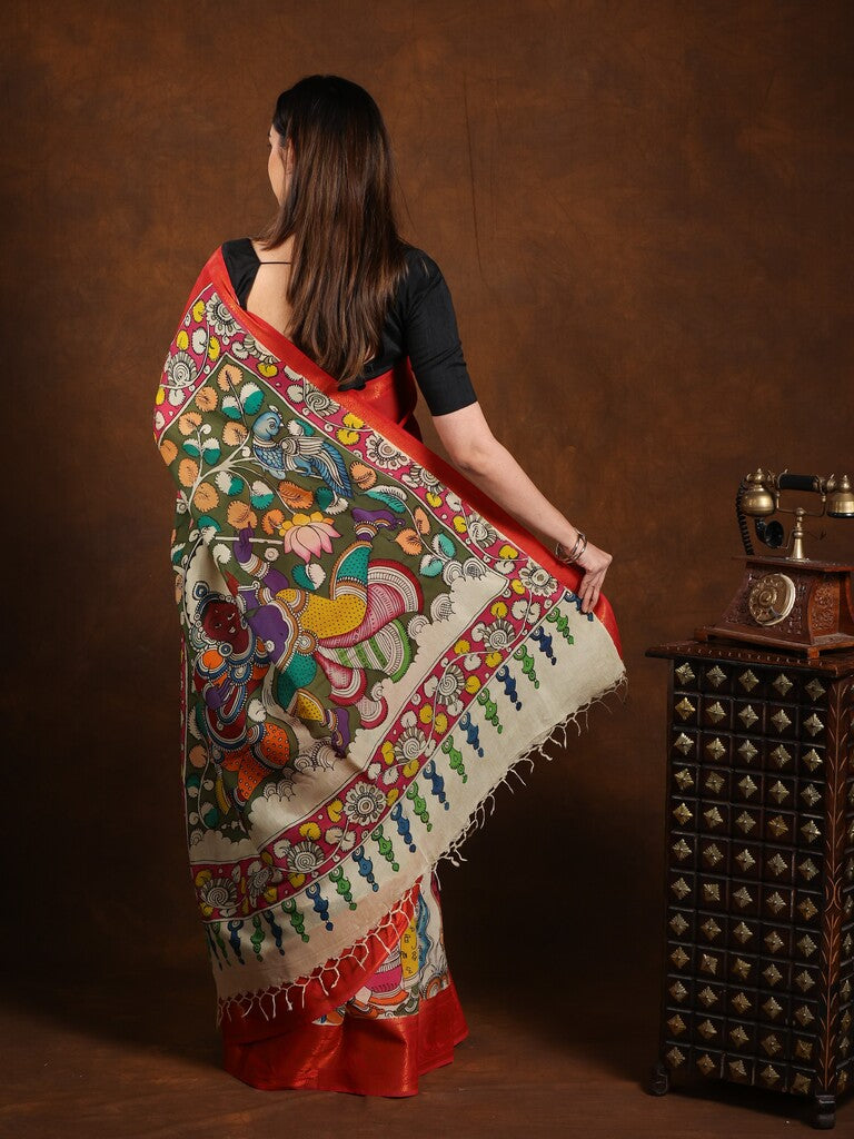 Pen kalamkari pattu saree in maroon color with contrast zari border and printed pallu & attached blouse