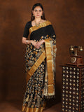 Pen kalamkari pattu saree in black color with contrast zari border and printed pallu & attached blouse