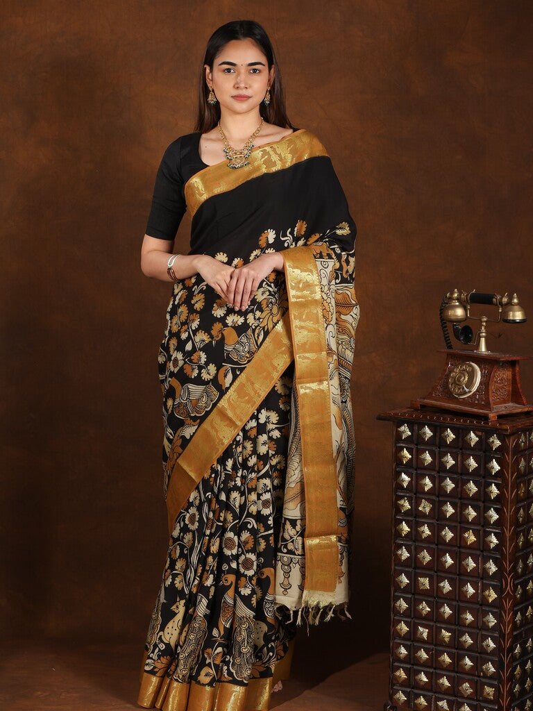Pen kalamkari pattu saree in black color with contrast zari border and printed pallu & attached blouse