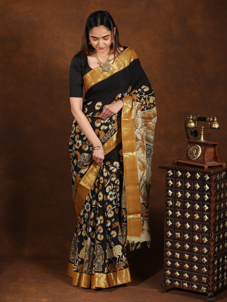 Pen kalamkari pattu saree in black color with contrast zari border and printed pallu & attached blouse