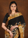 Pen kalamkari pattu saree in black color with contrast zari border and printed pallu & attached blouse