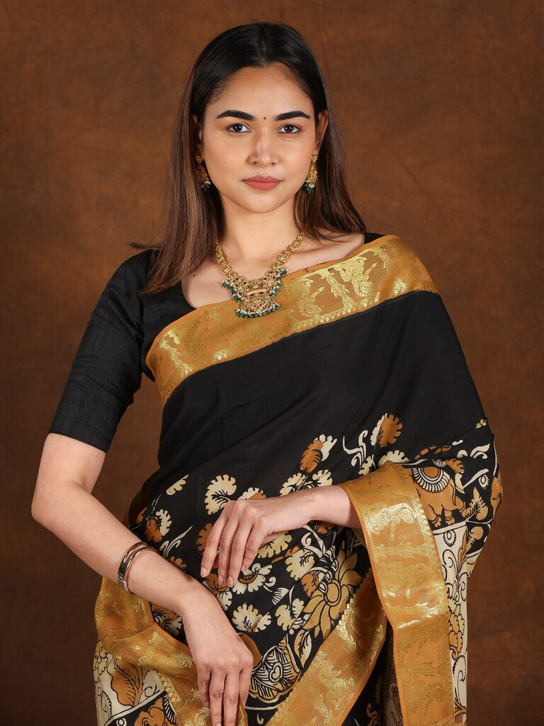 Pen kalamkari pattu saree in black color with contrast zari border and printed pallu & attached blouse
