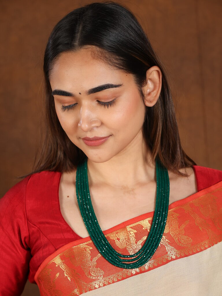 Pen kalamkari pattu saree in cream color with contrast zari border and printed pallu & attached blouse