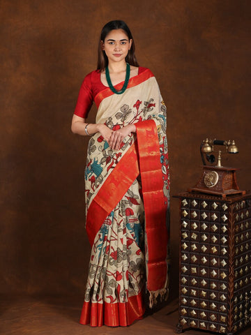 Pen kalamkari pattu saree in cream color with contrast zari border and printed pallu & attached blouse
