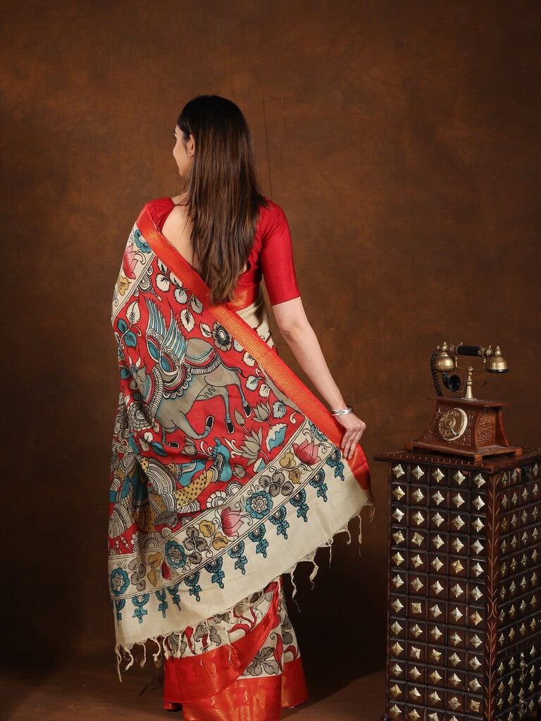 Pen kalamkari pattu saree in cream color with contrast zari border and printed pallu & attached blouse