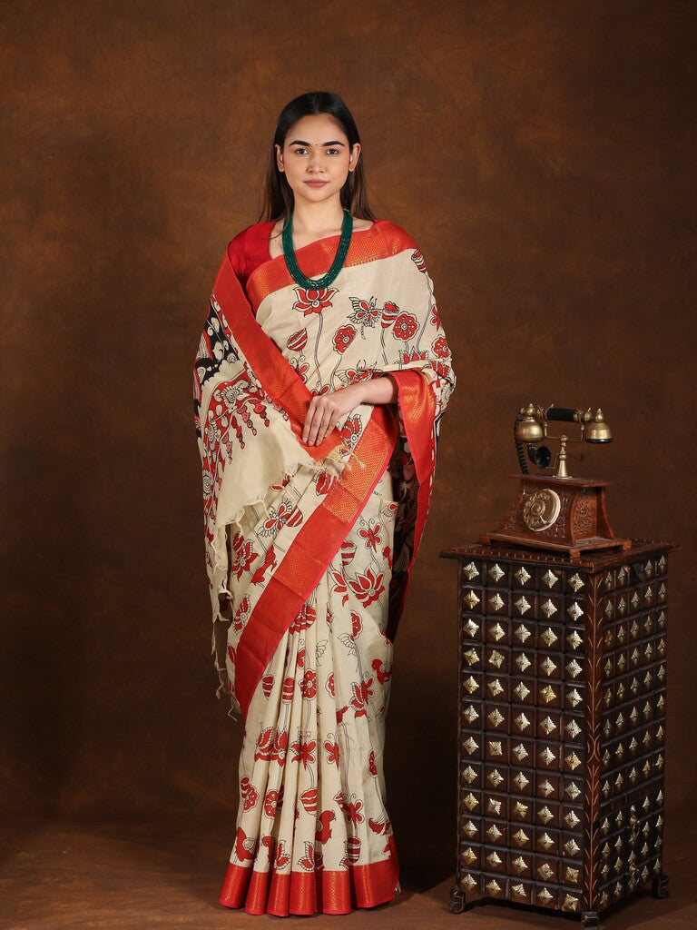Pen kalamkari pattu saree in cream color with contrast zari border and printed pallu & attached blouse