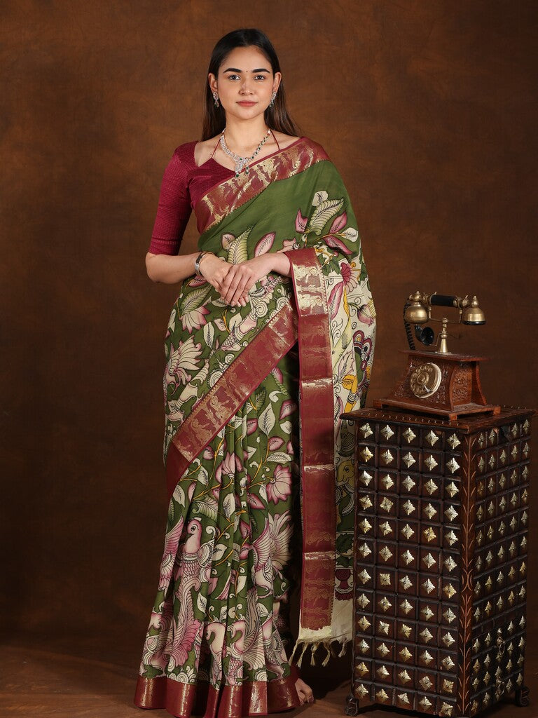 Pen kalamkari pattu saree olive green color with contrast zari border and printed pallu & attached blouse