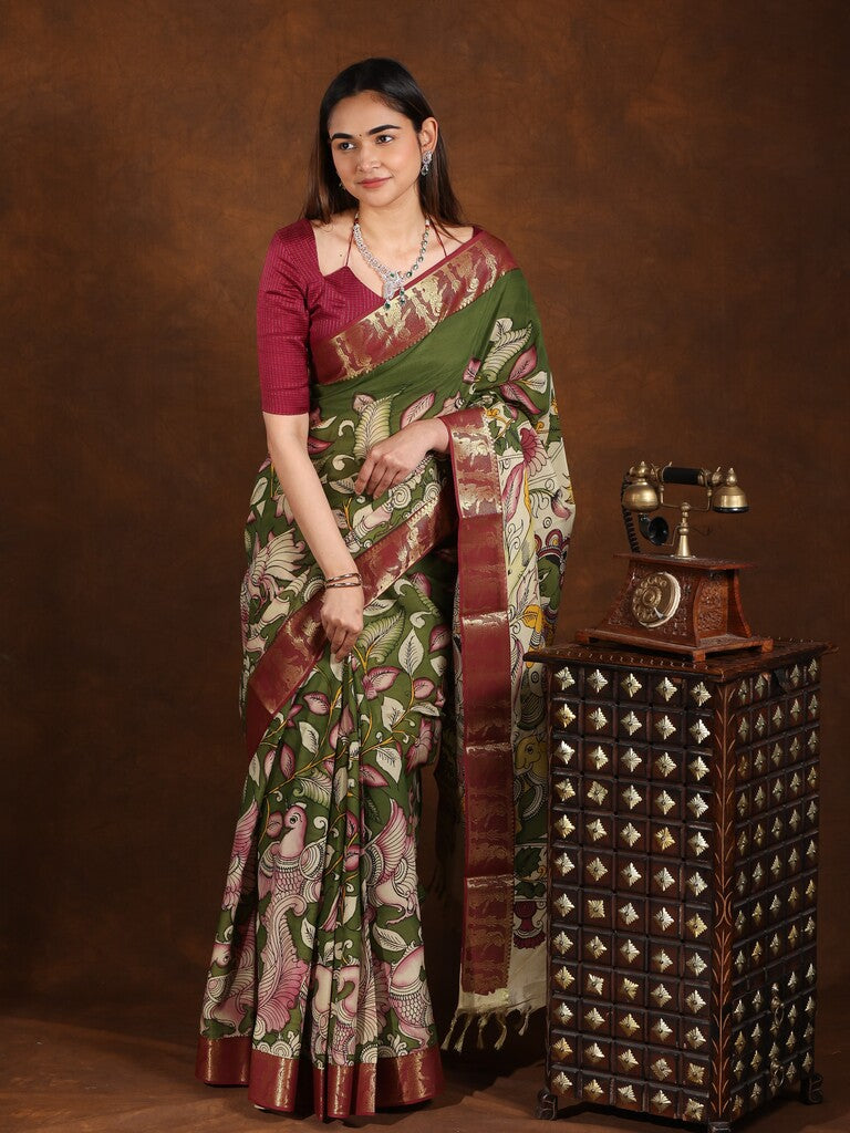 Pen kalamkari pattu saree olive green color with contrast zari border and printed pallu & attached blouse