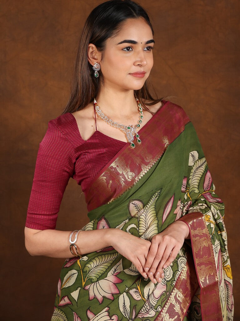 Pen kalamkari pattu saree olive green color with contrast zari border and printed pallu & attached blouse