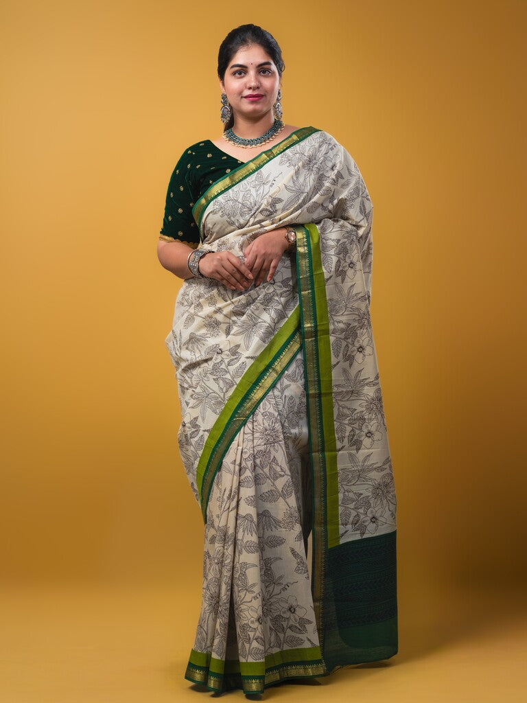 Maheswari fancy saree white color allover prints & zari border with short pallu and plain contrast blouse