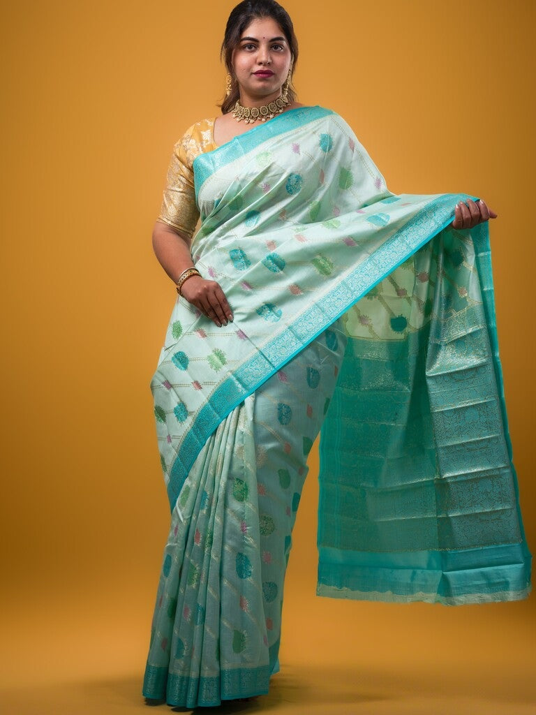 Raw mango pattu saree sea blue color allover zari weaves & zari border with rich pallu and attached plain blouse