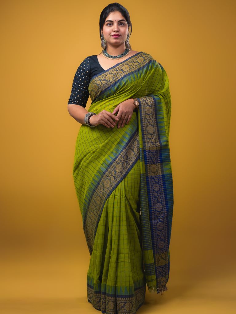 Jute kadhi cotton parrot green color allover checks & contrast border with contrast pallu and running blouse