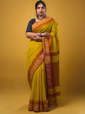 Jute kadhi cotton golden yellow color allover checks & contrast border with contrast pallu and running blouse