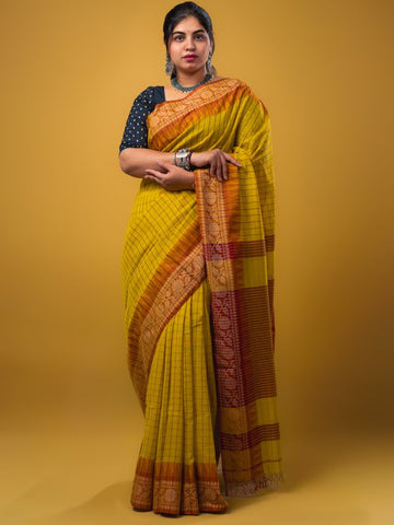 Jute kadhi cotton golden yellow color allover checks & contrast border with contrast pallu and running blouse
