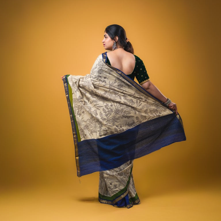 Maheswari fancy saree white color allover prints & zari border with short pallu and plain contrast blouse