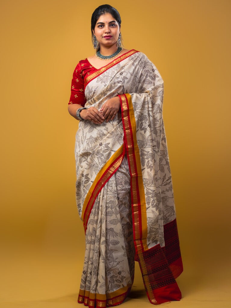 Maheswari fancy saree white color allover prints & zari border with short pallu and plain contrast blouse