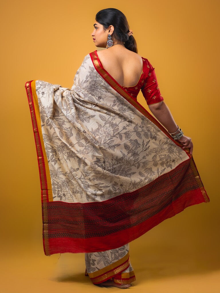 Maheswari fancy saree white color allover prints & zari border with short pallu and plain contrast blouse