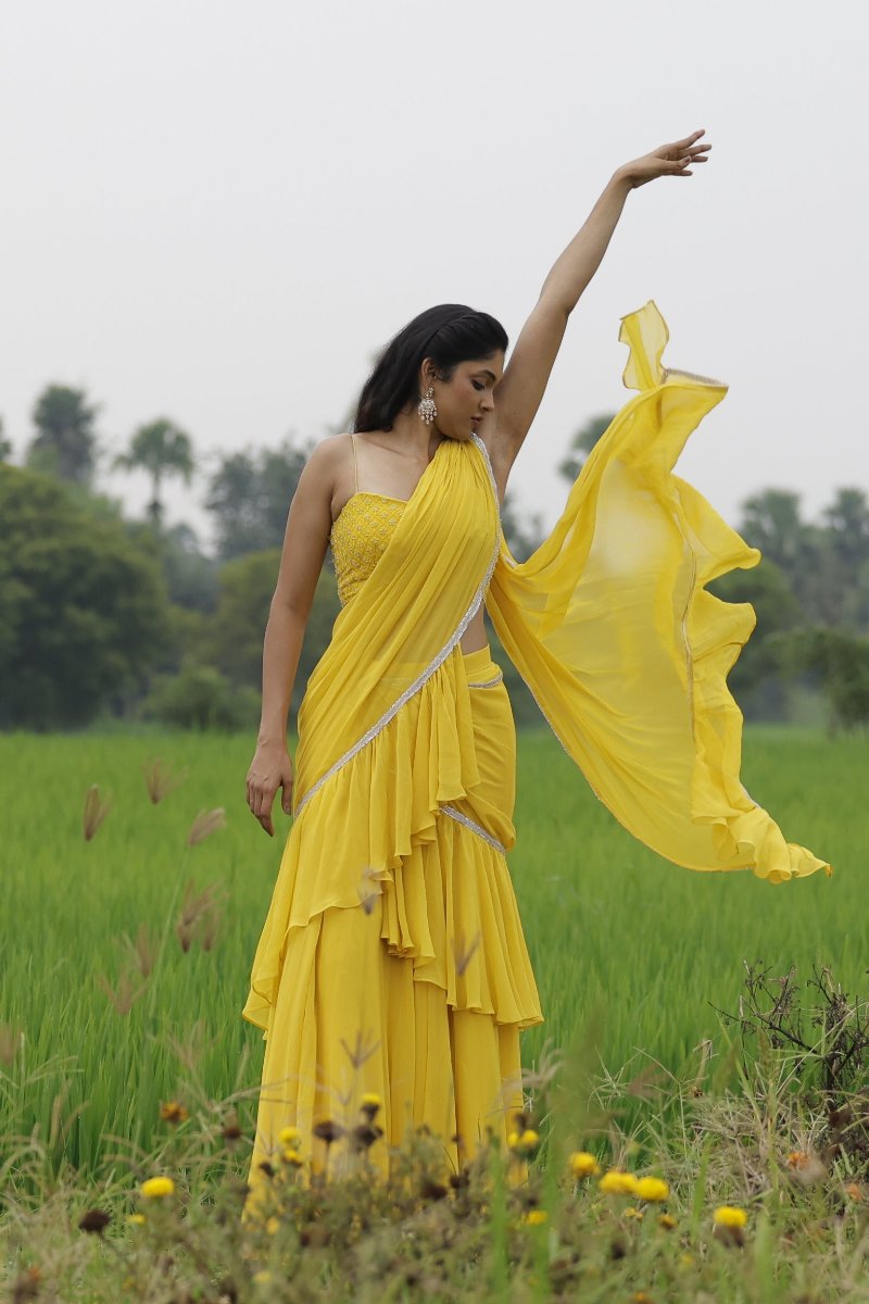 Yellow ruffle saree with handwork viscose organza top