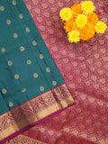 Kanchi pattu saree peacock blue color allover zari motifs & zari border with rich pallu and contrast plain blouse