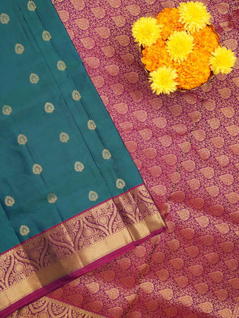 Kanchi pattu saree peacock blue color allover zari motifs & zari border with rich pallu and contrast plain blouse