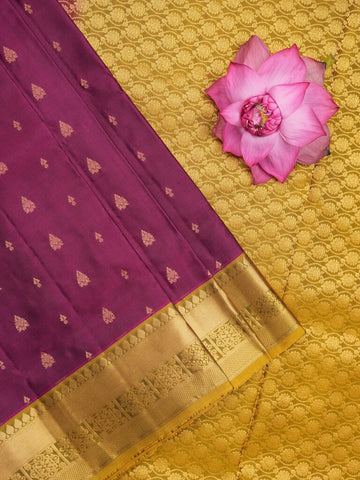 Kanchi pattu saree dark wine color allover zari motifs & zari border with rich pallu and contrast plain blouse