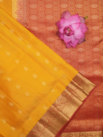 Kanchi pattu saree golden yellow color allover zari motifs & zari border with rich pallu and contrast plain blouse