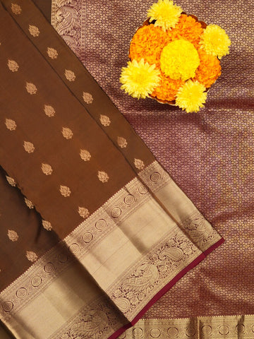 Kanchi pattu saree brown color allover zari motifs & kanchi border with rich pallu and contrast plain blouse