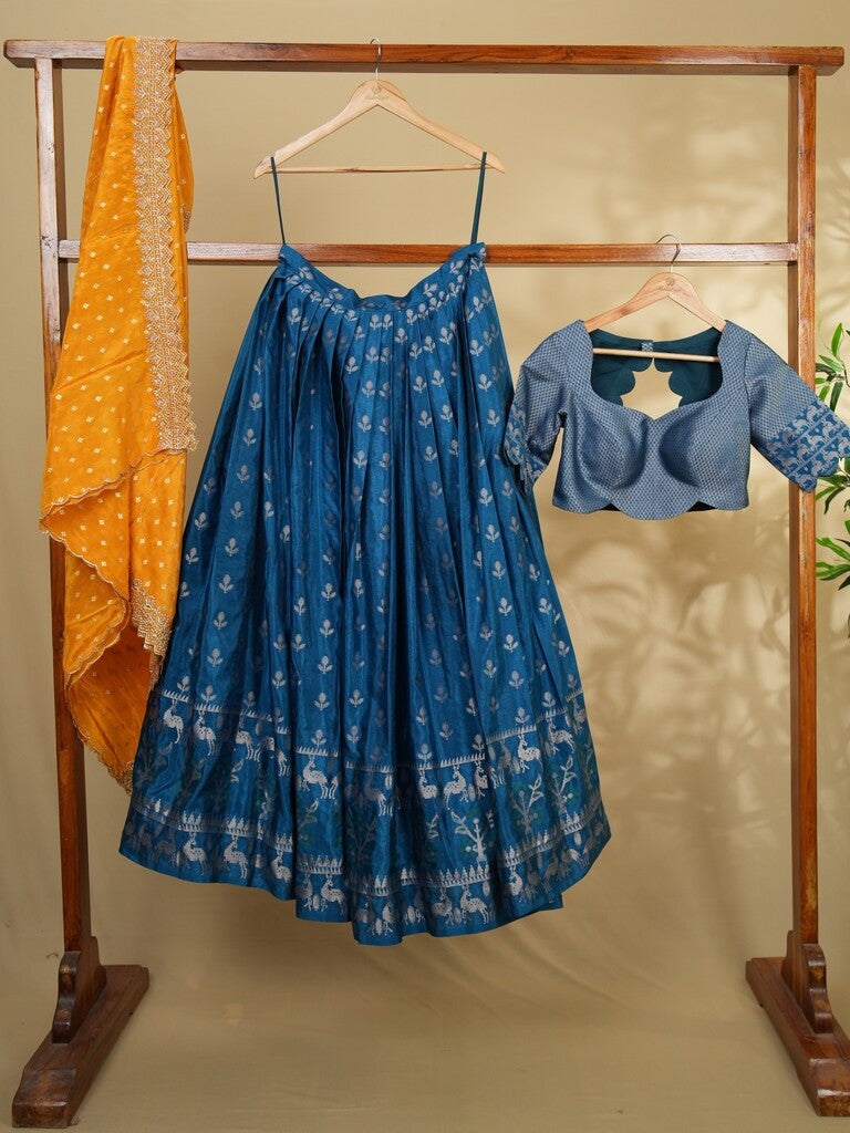 Raw mango lehenga set in peacock blue color with elegant weaving | Ready to wear