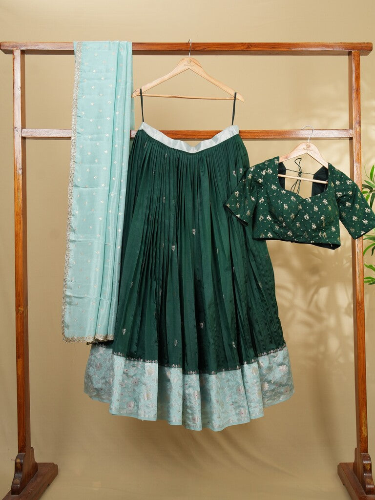 Raw mango lehenga set in dark green color with elegant weaving | Ready to wear