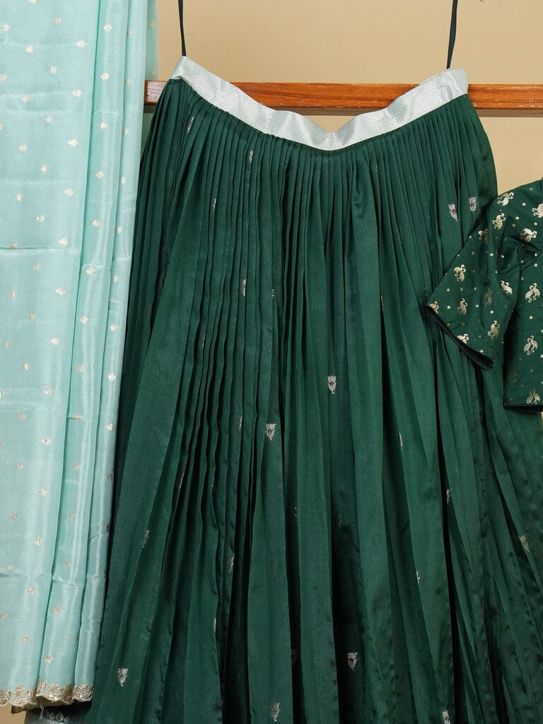 Raw mango lehenga set in dark green color with elegant weaving | Ready to wear