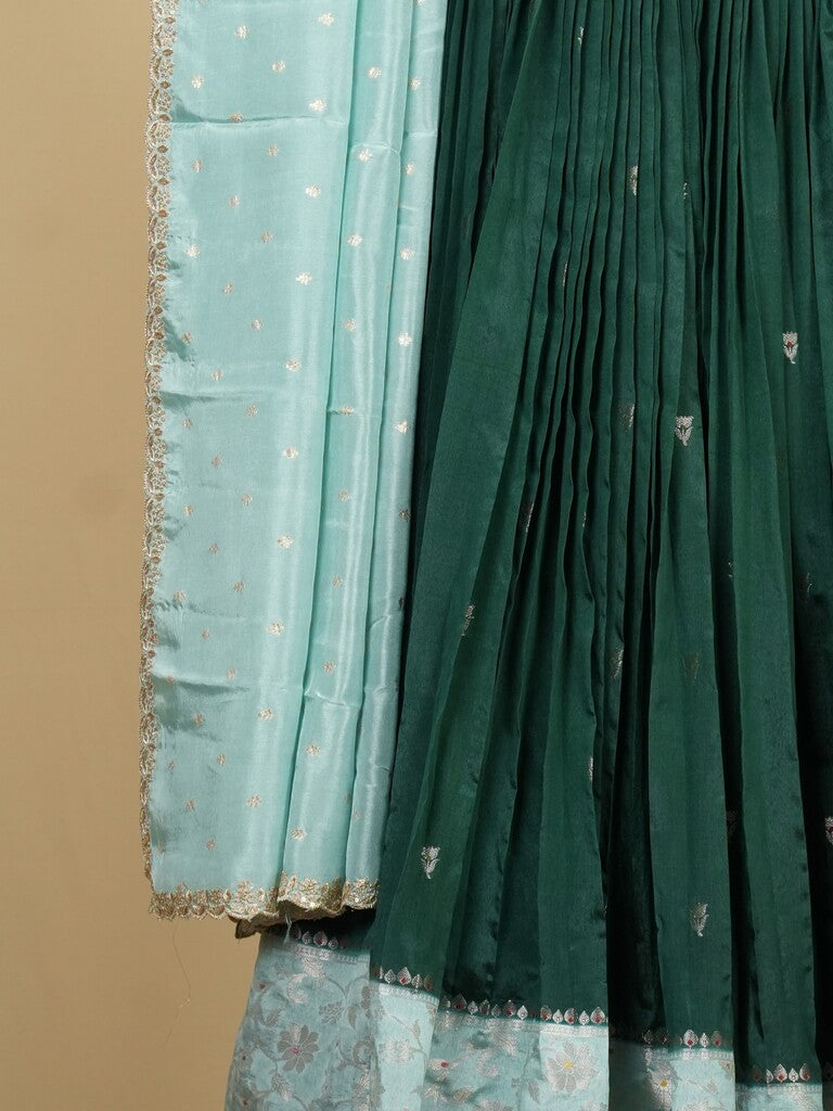 Raw mango lehenga set in dark green color with elegant weaving | Ready to wear