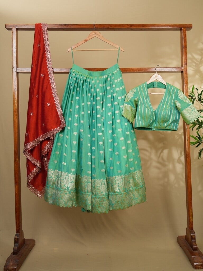 Classy banaras lehenga set in lux green featuring rich weaves with fine zari border | Ready to wear