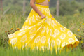 Yellow Viscose organza top & Printed georgette lehenga with handwork