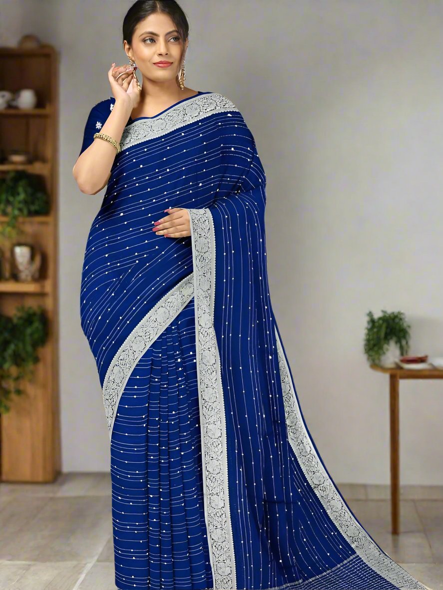 Chiffon fancy saree royal blue color allover stripes and sequence work & zari border with short pallu and attached blouse