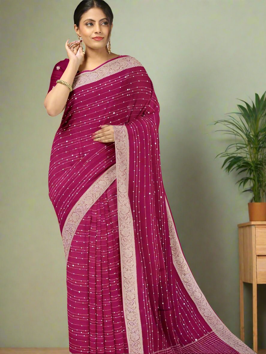 Chiffon fancy saree magenta color allover stripes and sequence work & zari border with short pallu and attached blouse