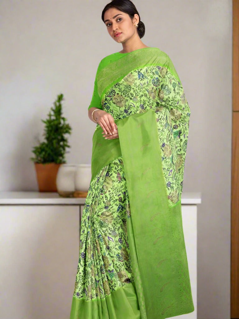 Dola silk fancy saree light green color allover prints & big zari border with rich pallu and plain contrast blouse