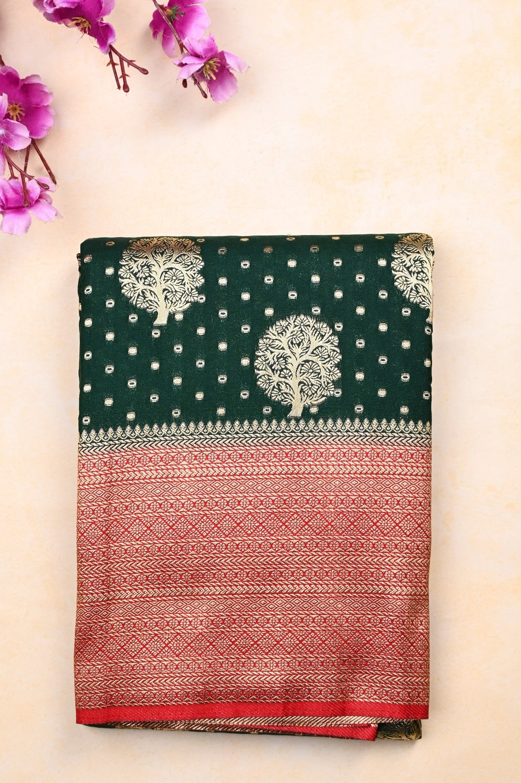 Banaras fancy saree green and red color with allover zari motive weaves, big zari border, pallu and plain blouse.
