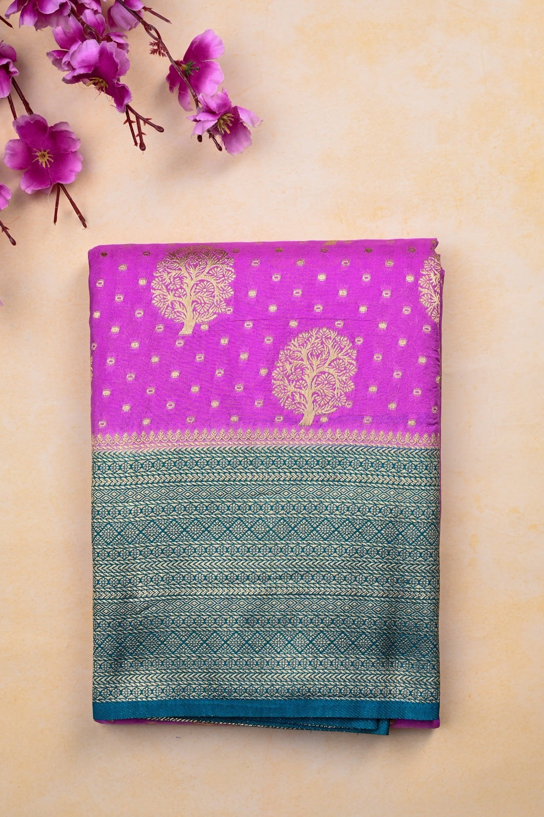 Banaras fancy saree lavender and sea green color with allover zari motive weaves, big zari border, pallu and plain blouse.