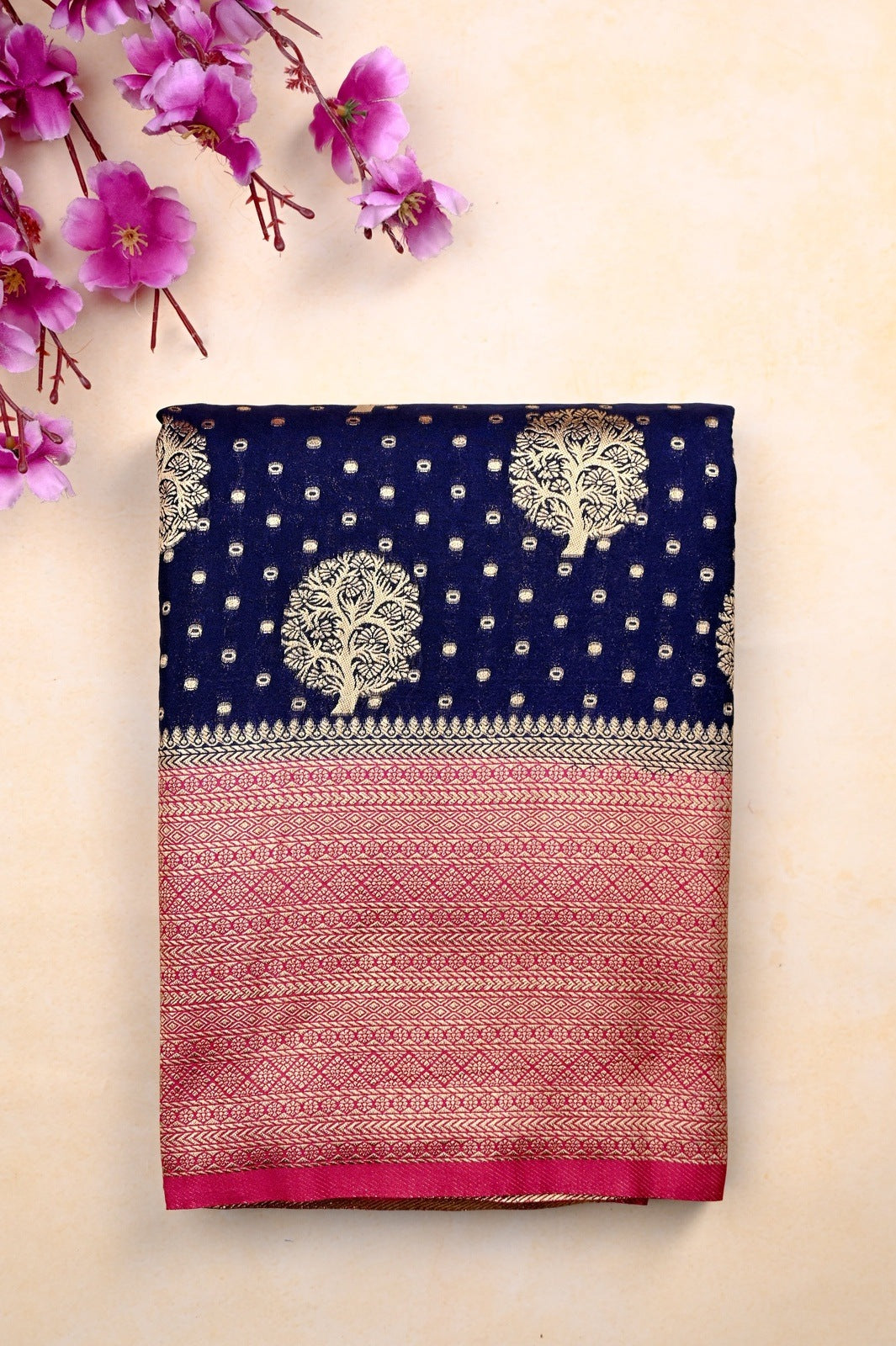 Banaras fancy saree navy blue and pink color with allover zari motive weaves, big zari border, pallu and plain blouse.
