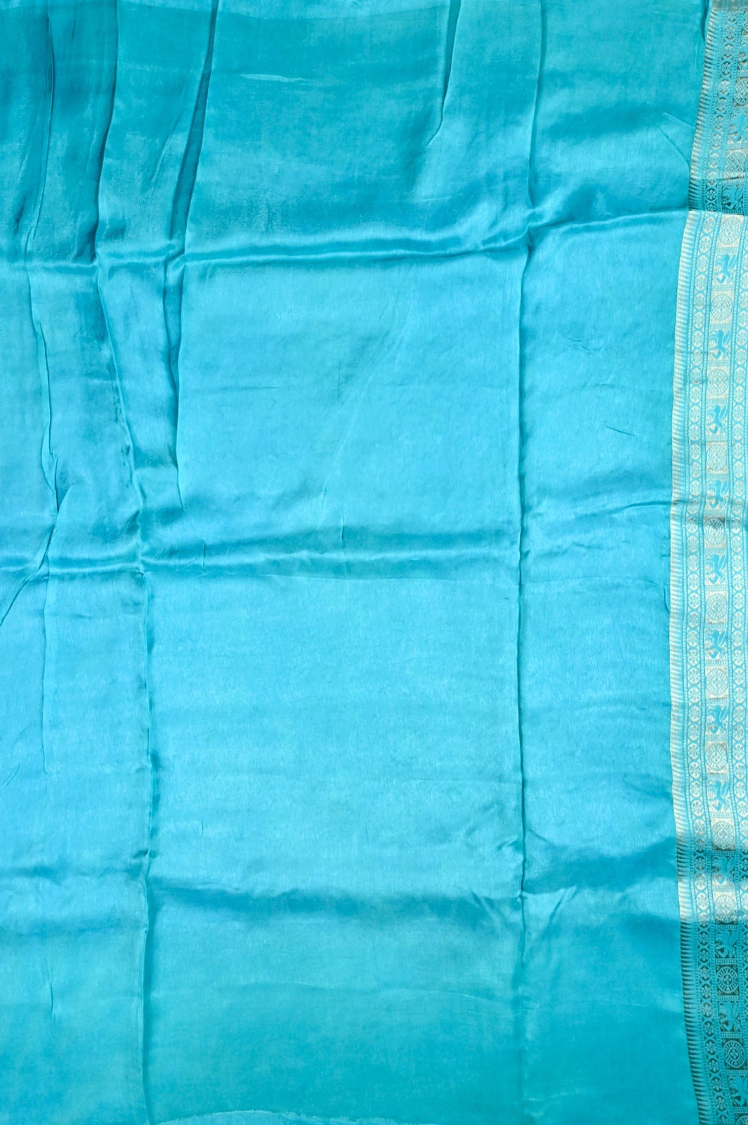 Dola silk saree peacock blue color with allover zari motive weaves, big zari wooven border, pallu and plain blouse