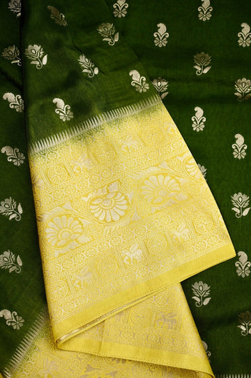 Dola silk saree green color with allover zari motive weaves, big zari wooven border, pallu and plain blouse