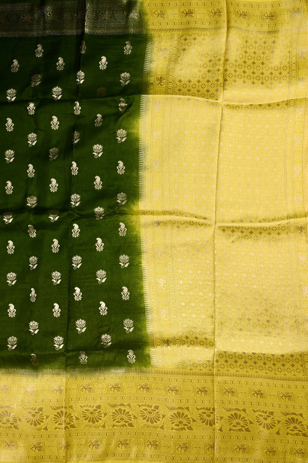 Dola silk saree green color with allover zari motive weaves, big zari wooven border, pallu and plain blouse