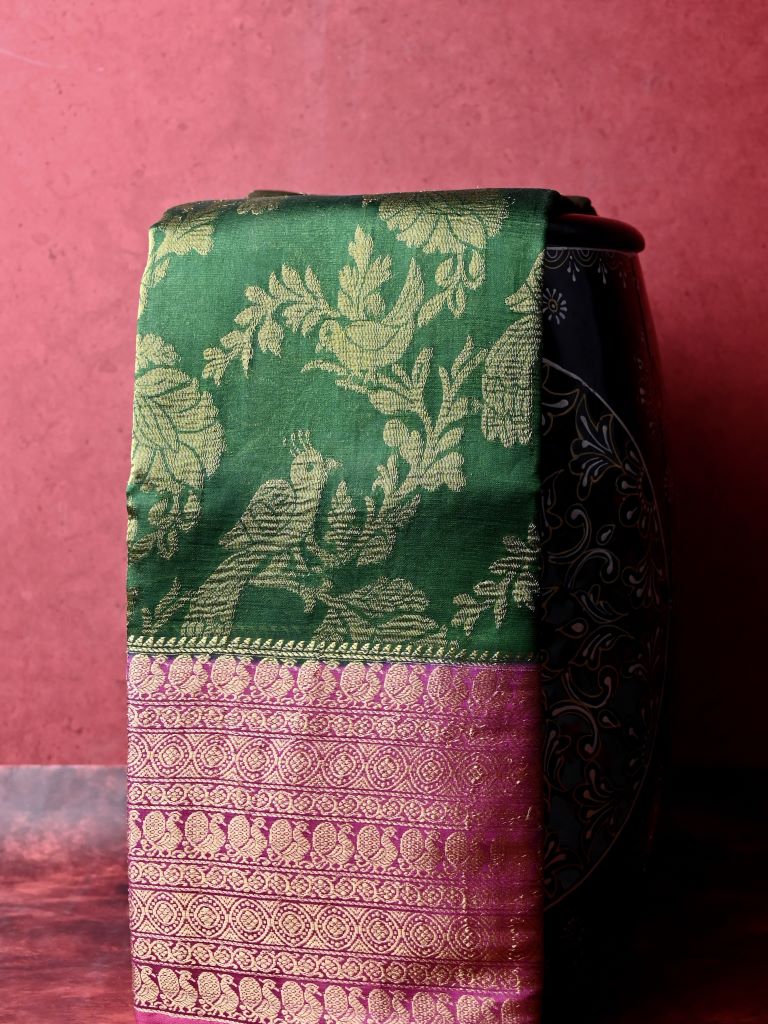 Kanchi kora fancy saree bottle green color allover zari weaving & zari border with rich contrast pallu and attached plain blouse