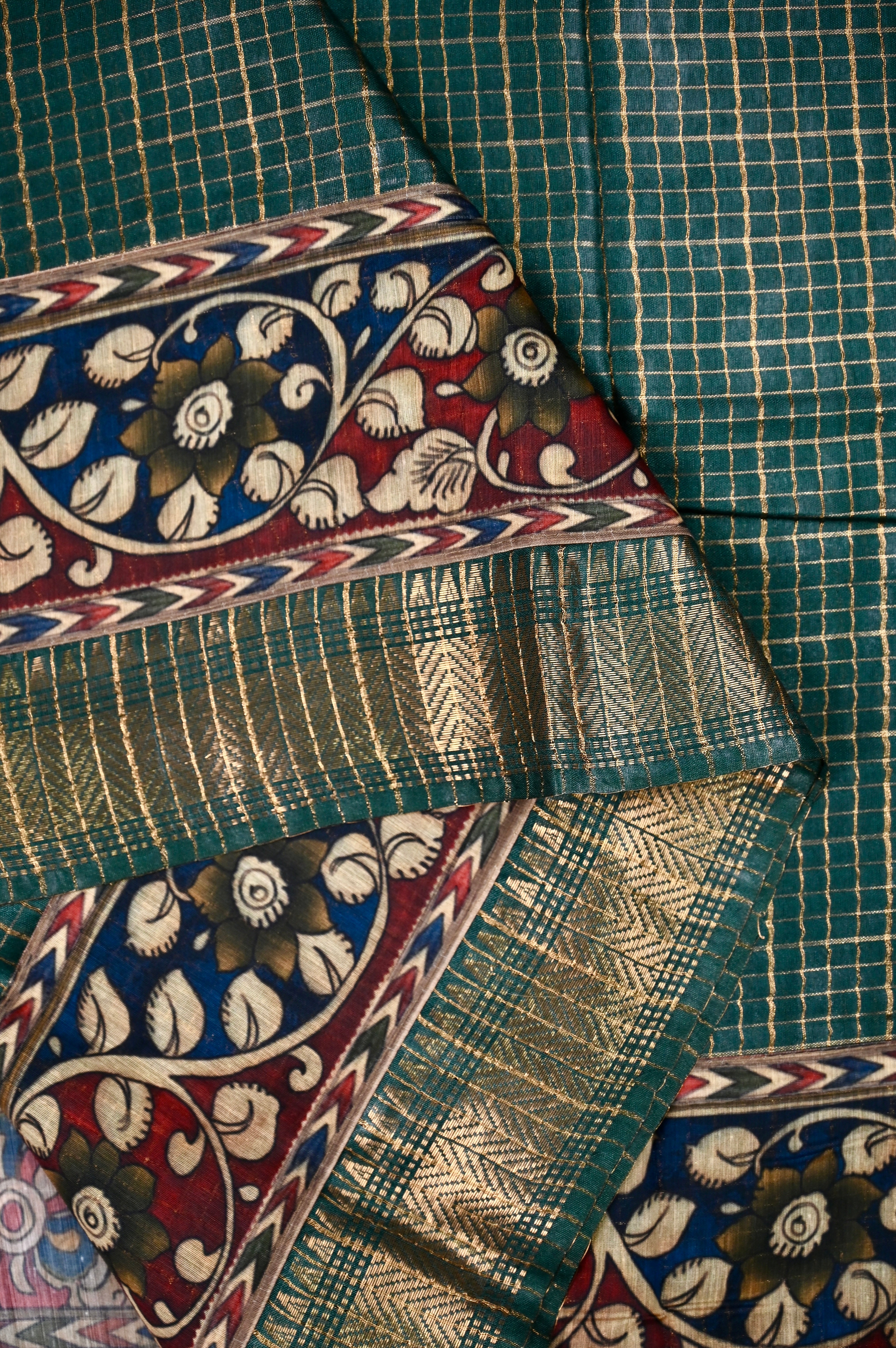 Bagalpur fancy saree green color with allover zari checks with printed & zari weaving border with big pallu, printed and checks blouse.
