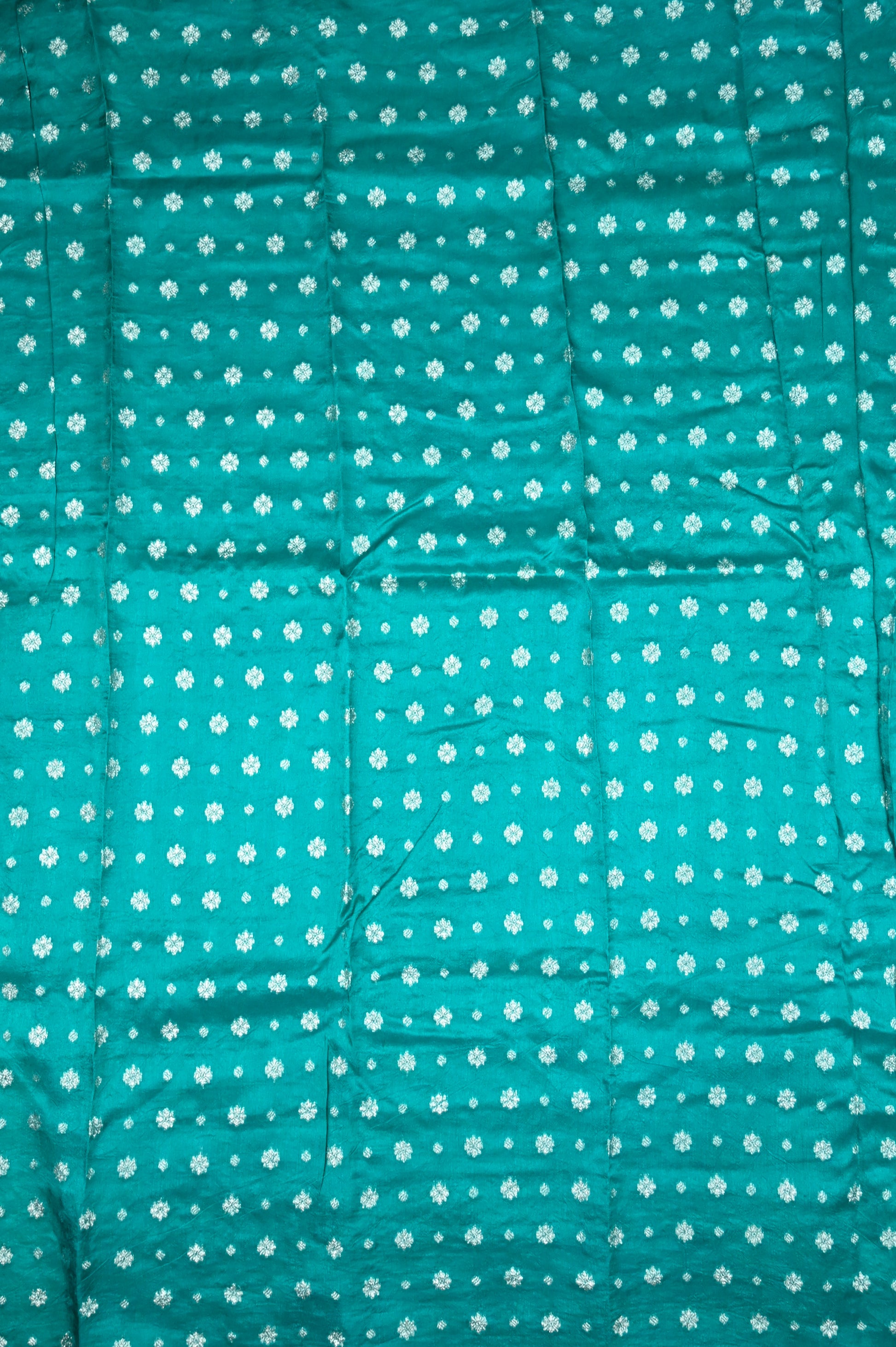 Dola silk saree sea green color with allover zari checks, big zari border, short pallu and brocade blouse